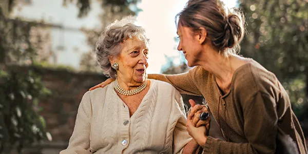 Retirement Wausau WI Mother And Daughter Talking About Estate Planning